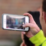 MALE HAND HOLDING SMARTPHONE 2